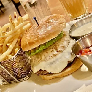 a burger and fries on a plate