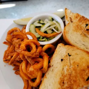 Cucumber salad  and curly fries