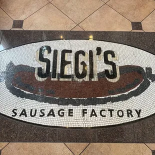 a sign for siegi's sausage factory