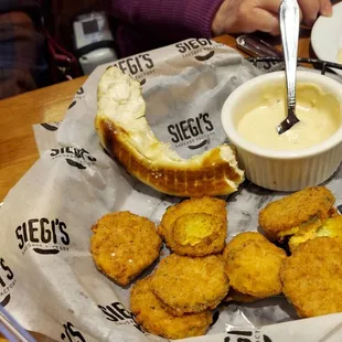 What's left of the fried pickles &amp; pretzel.