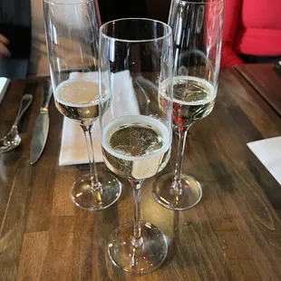 Complimentary bubbly (example: blanc de blancs)