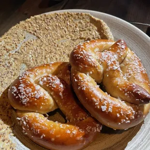 Homemade pretzel with grainy Dijon mustard