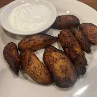 Fried Plantains served with sour cream  or refried beans