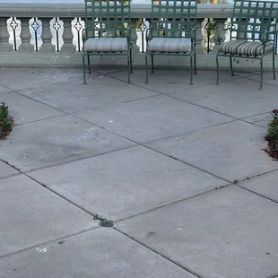 Patio should be  power washed the  cup on the chair is garbage .