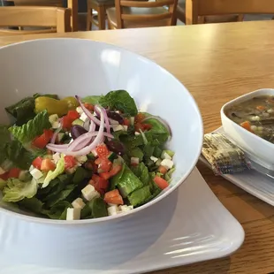 a bowl of salad and a bowl of soup