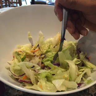 Fresh salad before the fatty pizza