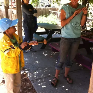 Making yarn from wool.