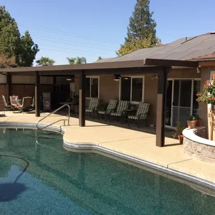Insulated patio with paddle fans