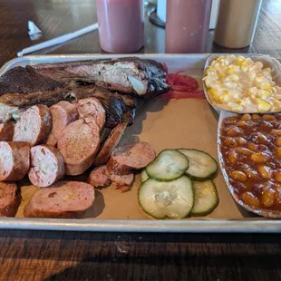 3 spare ribs, sausage, baked beans and cheesy corn.