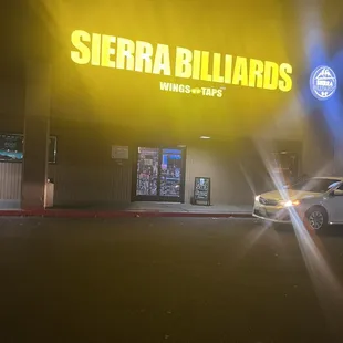 a car parked in front of a store