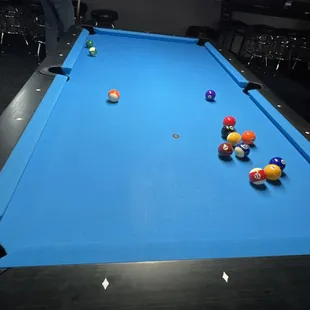 a pool table with balls on it
