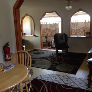 The Riverbend, looking from kitchen down to drop down sunroom with two single beds