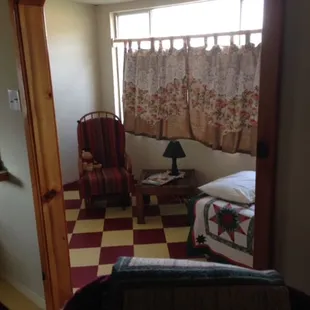 Sunroom in Riverbend cottage boasts a view of the bend in the Kern River