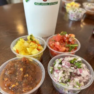 Fresh condiments at salsa bar