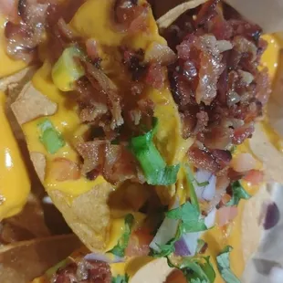 The bowling alley food is delicious from their loaded nachos to their BBQ bacon cheese burgers. This is a must try. Plus bowling and arcade!