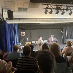 Watching "Killer in the Shadows"  by the visiting troupe Theater on the Move