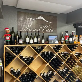 a wine rack with wine bottles
