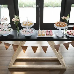 Chocolate covered strawberries and vanilla and red velvet cupcakes
