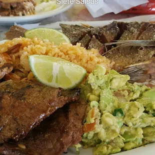 Combo plate. Usually comes with chicken, shrimp, and meat, but substituted the chicken for fried fish. All yumminess.