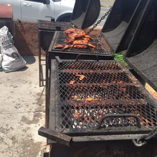 Grilling chicken outside the restaurant