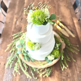 Wedding cake with green flowers-overhead shot