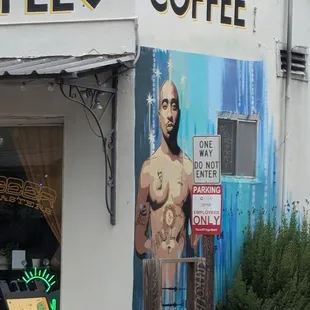 Mural on the side of the shop