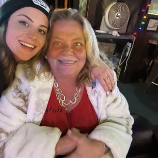 a woman and a woman sitting together