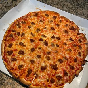 Large Italian sausage pizza  via pickup from the Signature! They had it ready and were very good at social distancing!