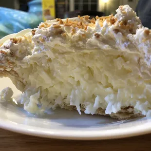Slice of Coconut Cream Pie. LOOK at all that coconut goodness.