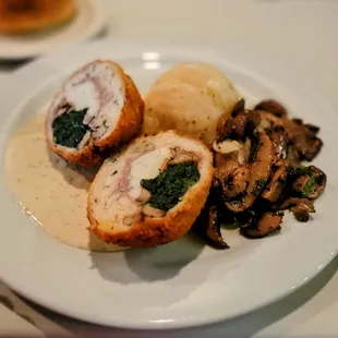 Stuffed chicken, mushrooms and scalloped potatoes