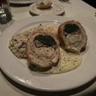 Stuffed chicken w/ risotto and scallop potatoes