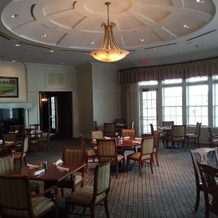 a dining room with a chandelier