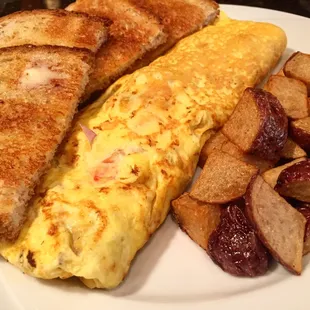 Signature omelette w/ white toast &amp; potatoes