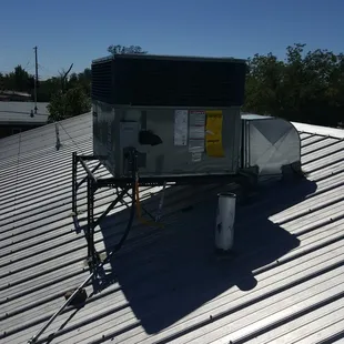 Pic 2: Replaced old rooftop unit with new Trane 3 ton 70k BTU 16 SEER Rooftop Unit