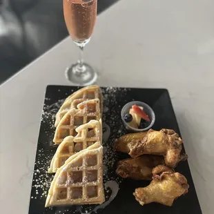 waffles, chicken wings, and champagne