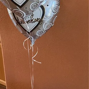 Anniversary flowers and balloons