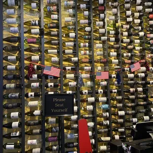 a wall of wine bottles