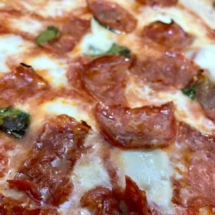 a pepperoni and cheese pizza