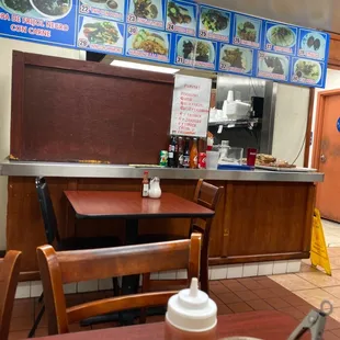 a table and chairs in a restaurant