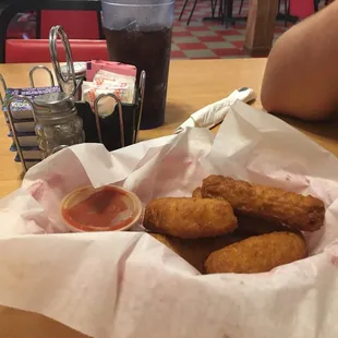 a basket of fried chicken nuggies