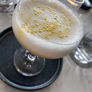 a glass of beer on a table