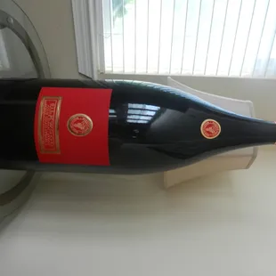 a bottle of wine on a table