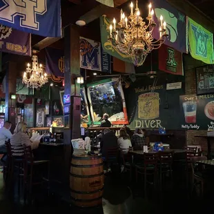 a bar with a chandelier