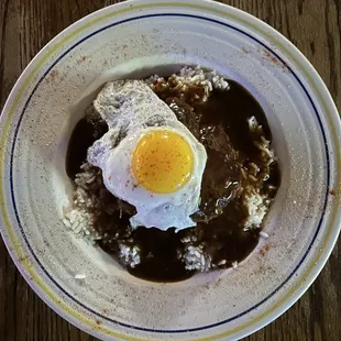 This is the Loco Moco dish that is made available at Silky&apos;s. The sear, and size of the burger is impressive.