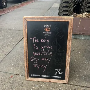 Signage on a rainy &amp; windy March day