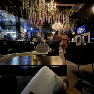 people sitting at a table in a restaurant