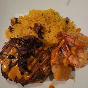 Crab cake with shrimp and saffron rice.