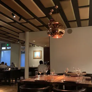 a dining room with tables and chairs