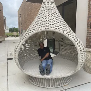 Beautifully designed, great coffee, food, and this really cool chair outside for pics.