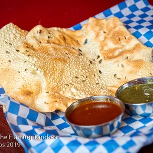 Pappadums Crispy Indian snack made from special blend of flour.